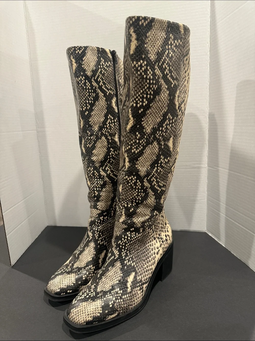 Women's Crown Vintage Knee-High Snake Print Boots in Black and Cream